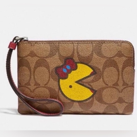 Coach Handbags - COACH CORNER ZIP WRISTLET IN SIGNATURE CANVAS WITH MS. PAC-MAN